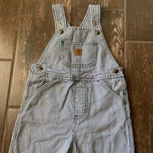 Blue and white pinstriped overall shorts